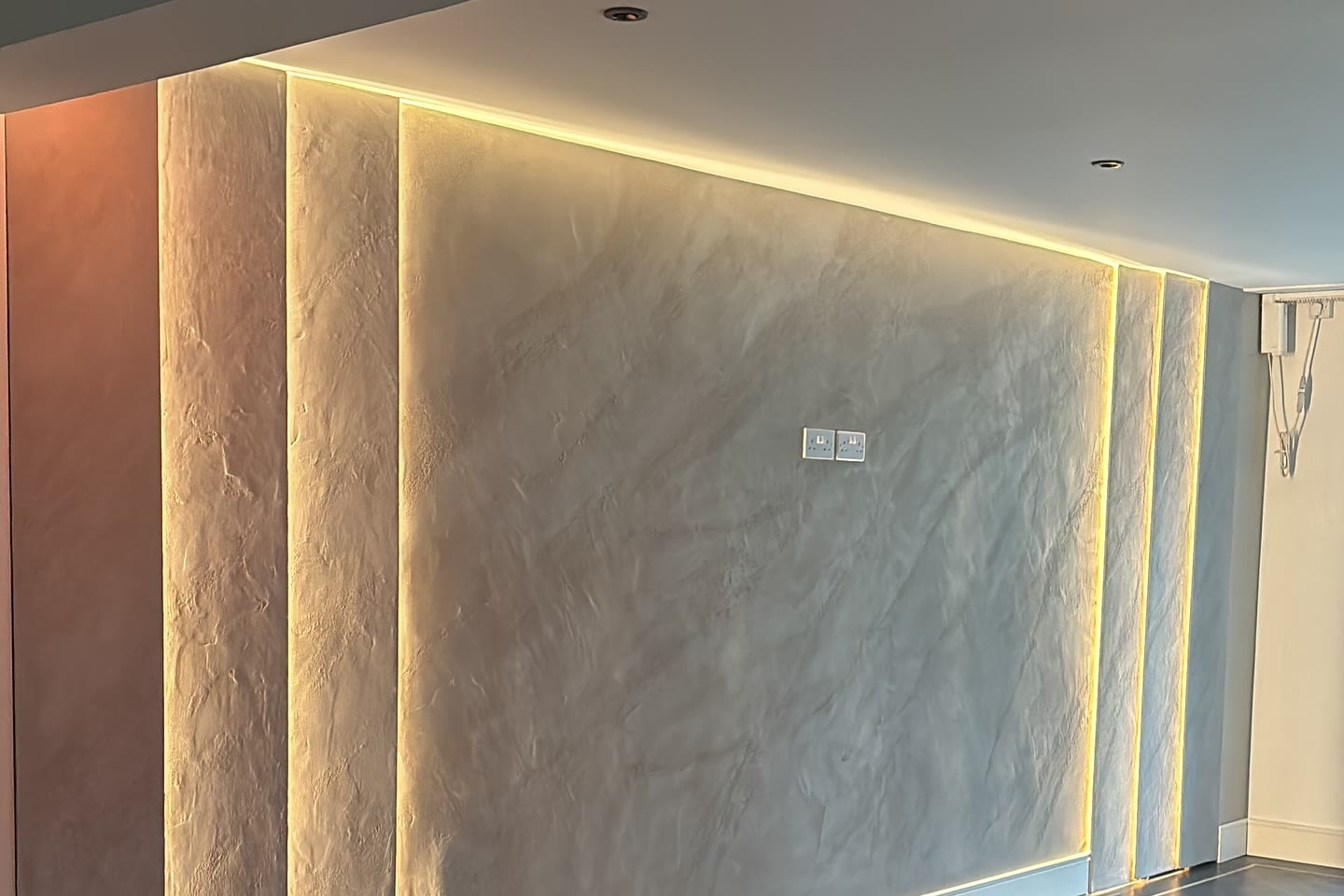 Backlit textured plaster wall panels