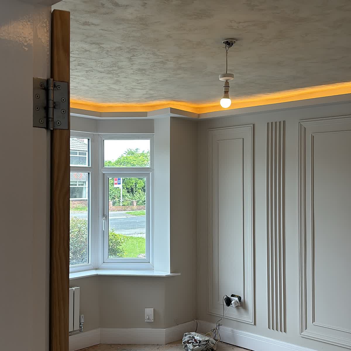 Metallic textured ceiling with chandelier