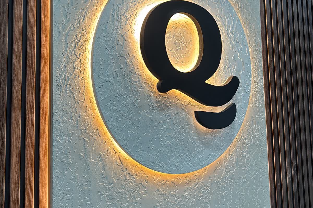 Restaurant signage: Pitted finish with a white pearl front, designed and made for a restaurant in Bolton.